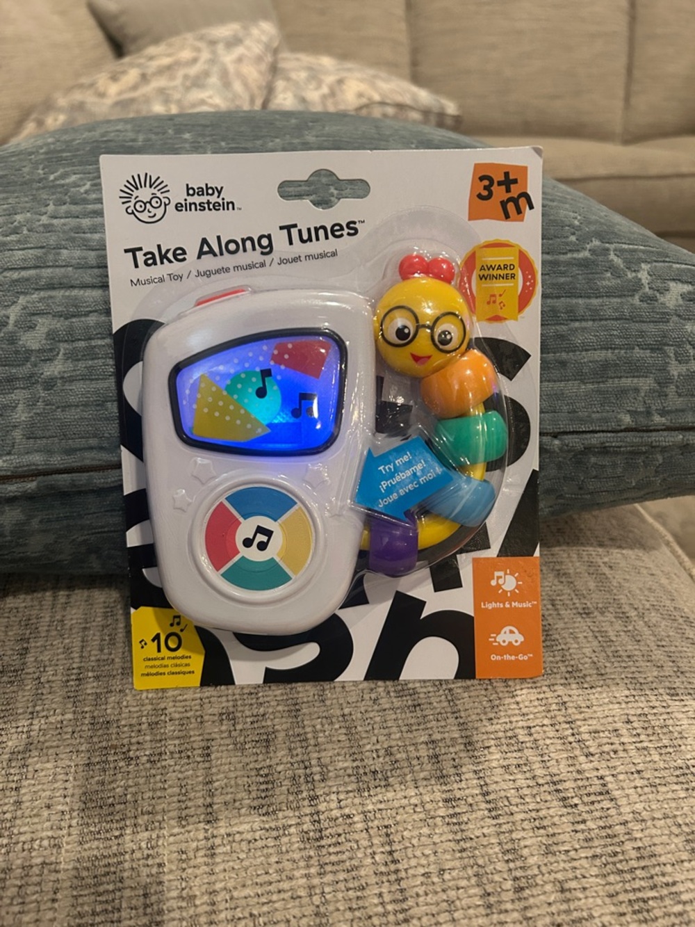 Baby Einstein Take Along Tunes Musical Toy - White with Multicolor Caterpillar